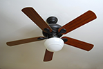 a modern ceiling fan installed on a textured white ceiling BYTx4L0Bi.150x100